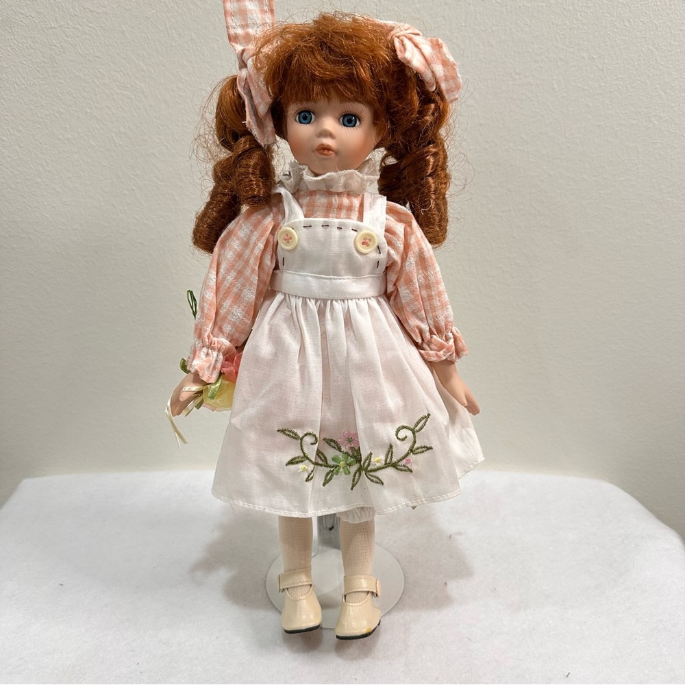 Classic Porcelain Doll with Red Hair